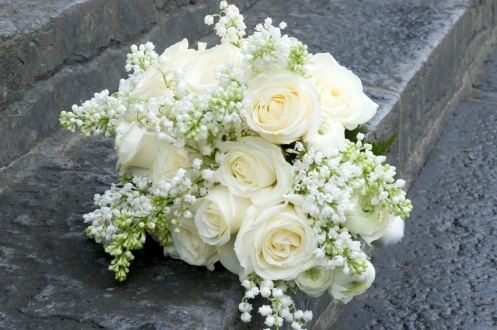 White bridal Bouquet with Roses Lily of the Valley Ranunculus and Lilac
