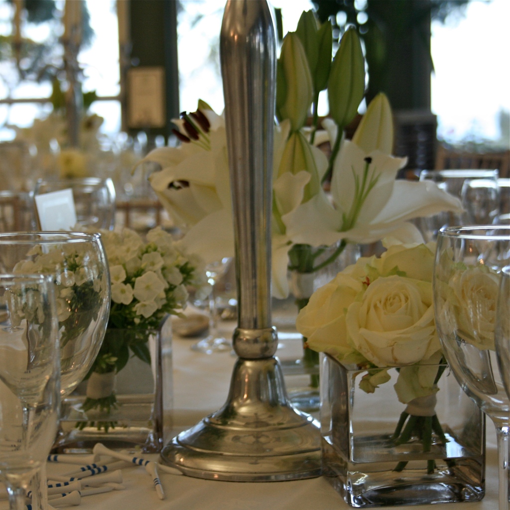 Table centre white wedding flowers