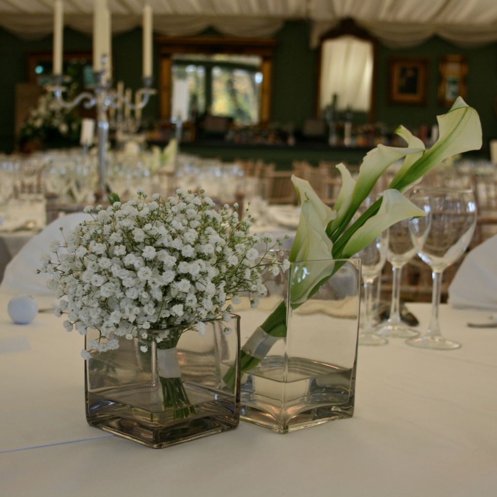 Perfect white wedding flower displays